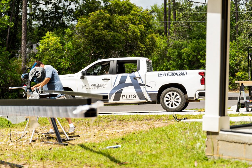 A Plus Patio & Screen crew on a job site