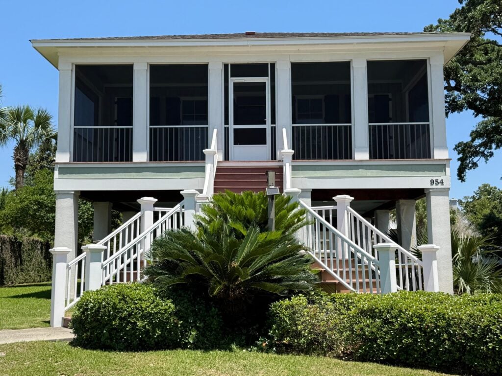 Elevated screen porch on a raised Gulf Coast home