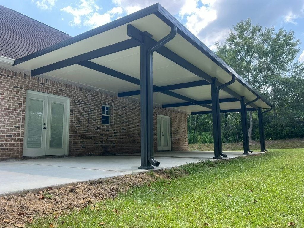 Concrete slab addition poured by A Plus Patio & Screen