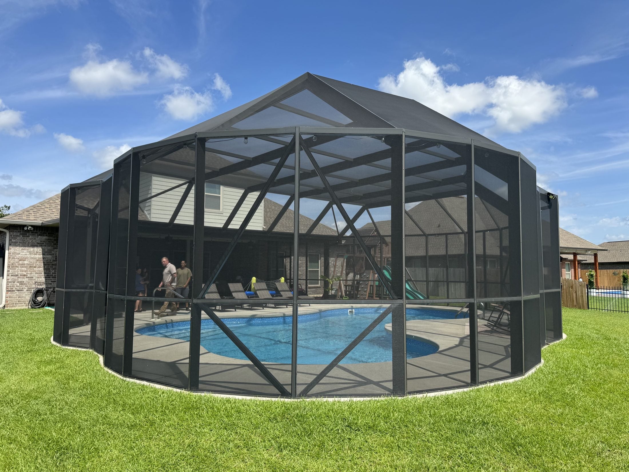 Screened pool enclosure built by A Plus Patio & Screen on the Mississippi Gulf Coast