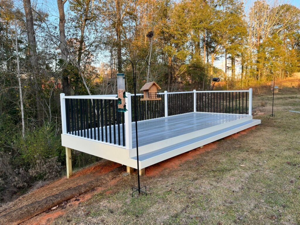 Composite deck with white aluminum railing