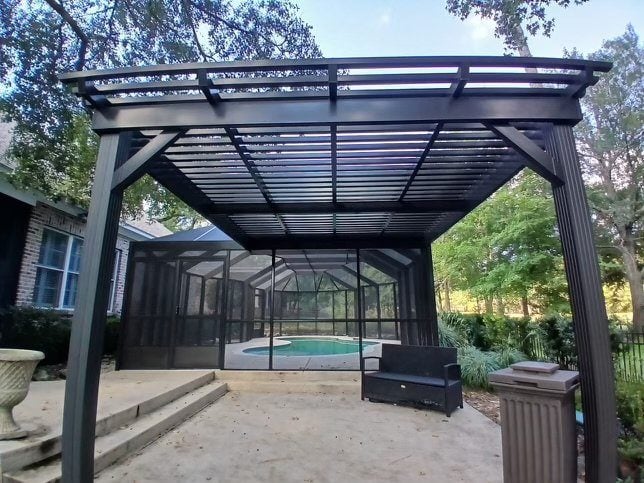 Aluminum pergola over a backyard patio