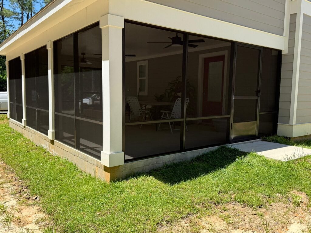 Custom screen room addition on a Gulf Coast home